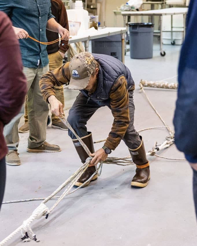 Man working with rope and line