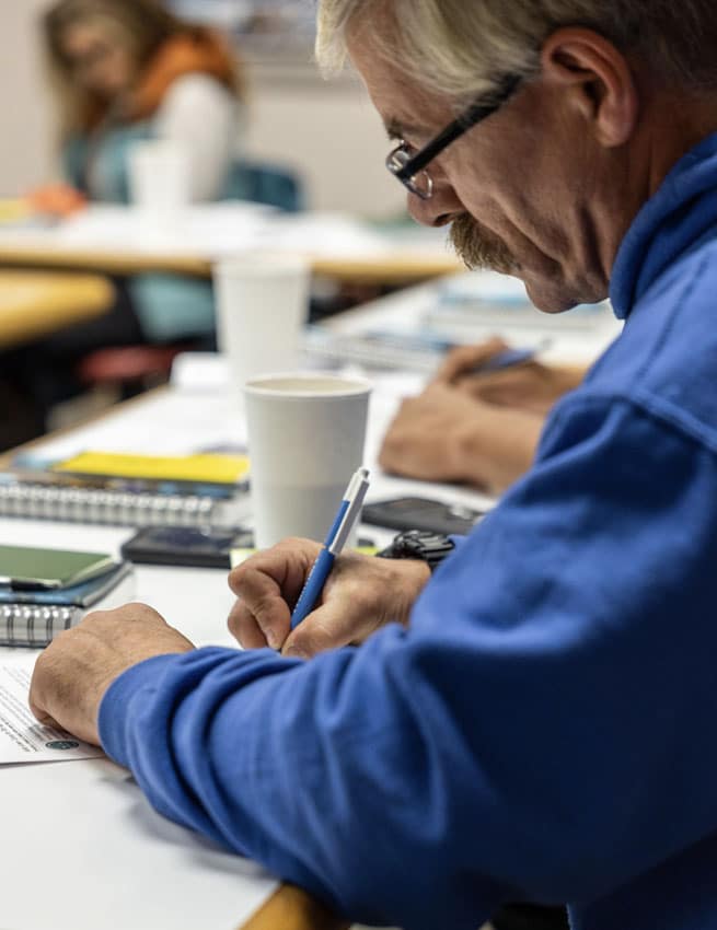 Man writing with pen